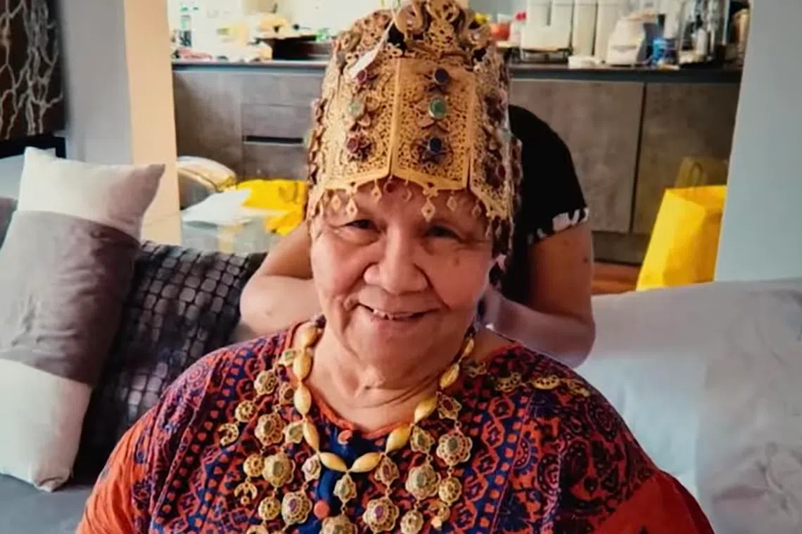 Dionne Marie Hanna has been charged in court in Singapore for conning three victims.