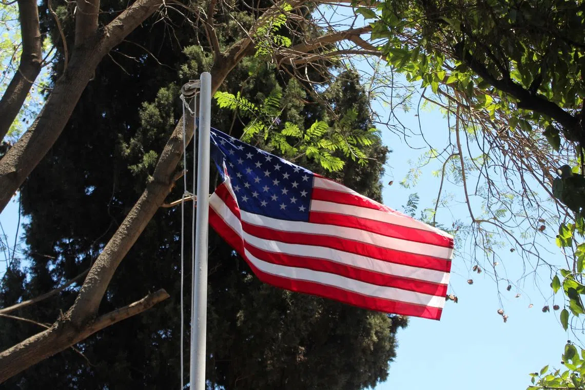 FILE PHOTO: The American flag is raised at U.S. ambassador's residency in Damascus, Syria May 29, 2025. REUTERS/Firas Makdesi/File photo