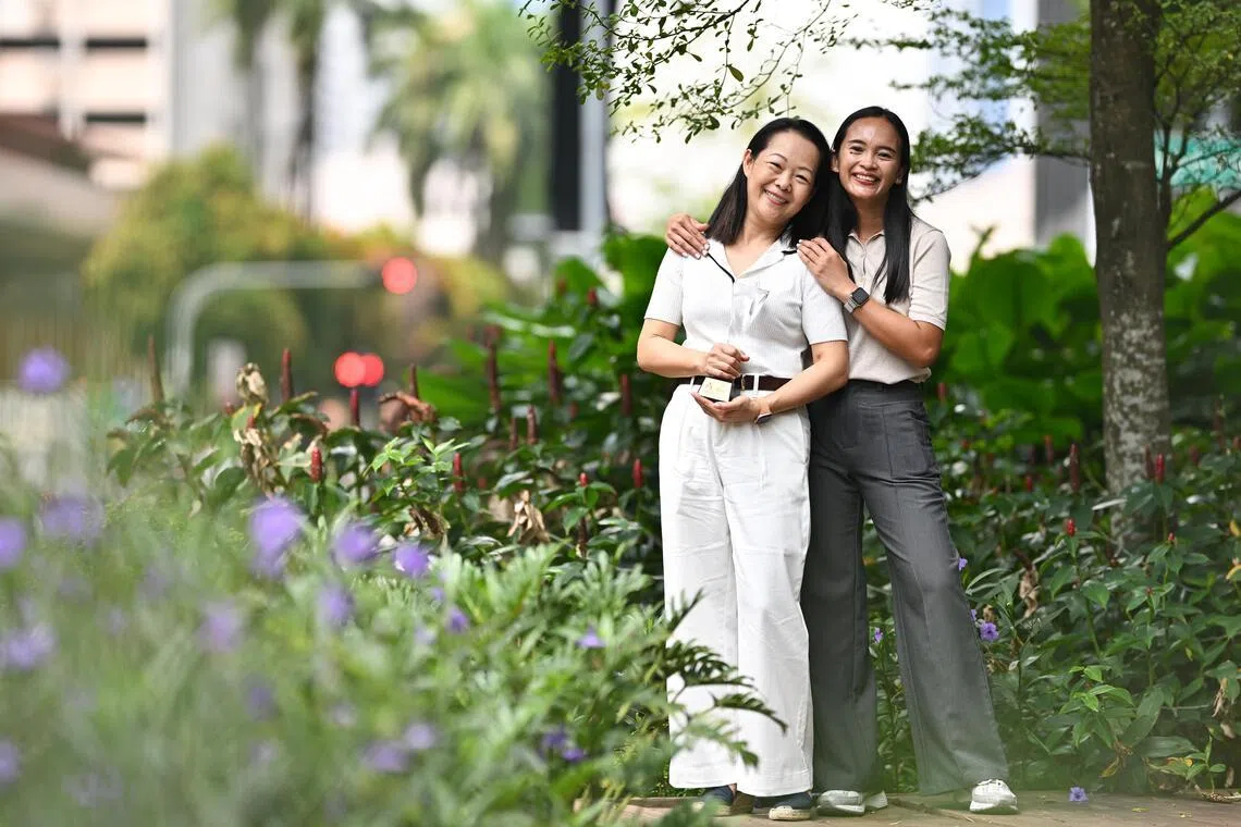 Madam Jamie Too (left), who received the Employer of the Year Award 2026, encouraged her domestic worker Ms Ika Septia Purnamasari to pursue higher education and funded part of it.