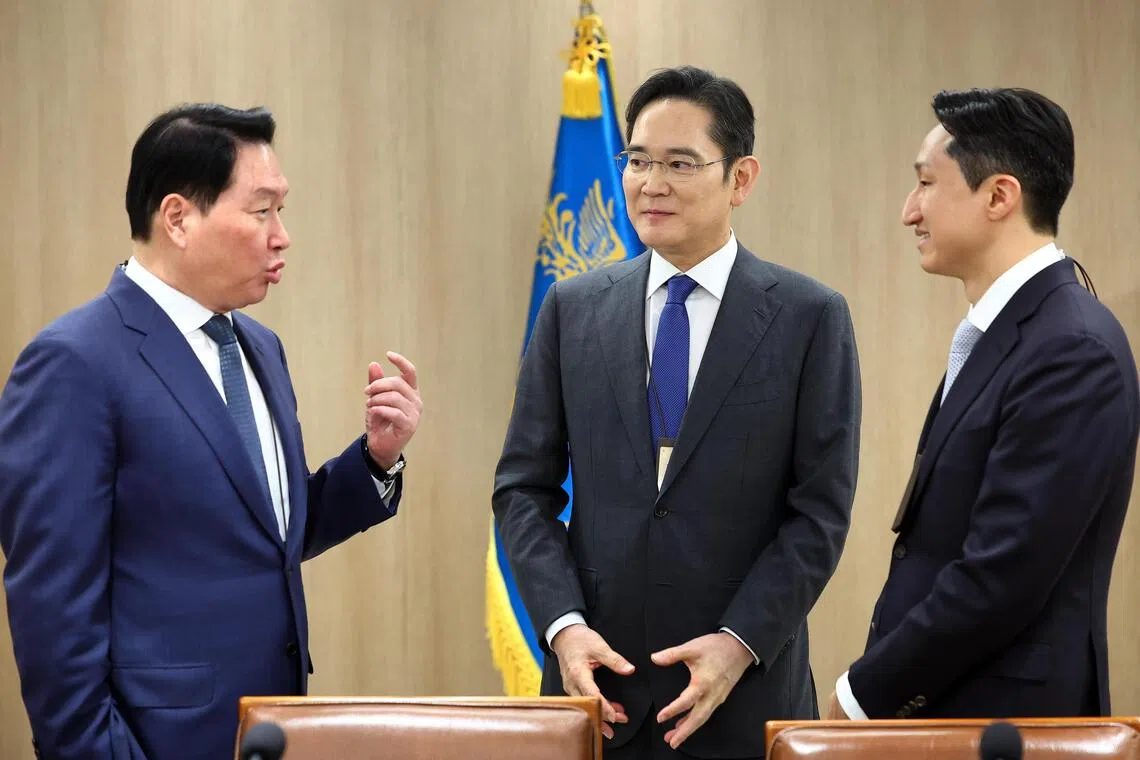 epa12528742 (L-R) Business leaders SK Group Chairman Chey Tae-won, Samsung Electronics Chairman Lee Jae-yong, and Hyundai Motor Group Executive Chair Euisun Chung attend a meeting headed by South Korean President Lee Jae Myung at the presidential office in Seoul, South Korea, 16 November 2025, to discuss follow-up measures after the release of a joint fact sheet on bilateral trade and security agreements with the United States.  EPA/YONHAP SOUTH KOREA OUT