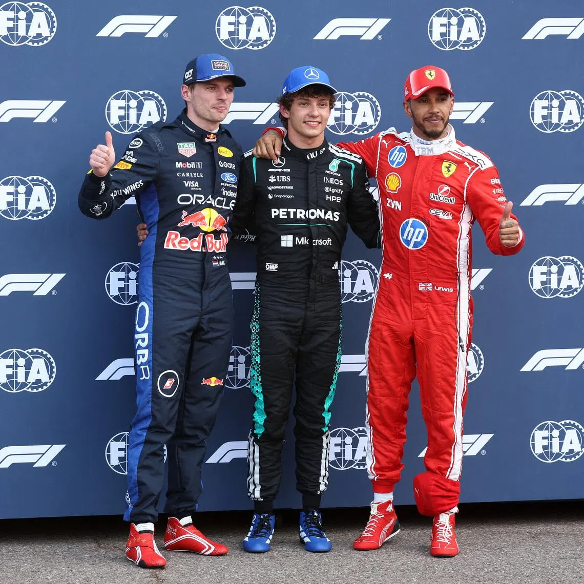 Formula One F1 - Monaco Grand Prix - Circuit de Monaco, Monaco - June 6, 2026 Mercedes' Kimi Antonelli celebrates after qualifying in pole position with second placed Red Bull's Max Verstappen and third placed Ferrari's Lewis Hamilton REUTERS/Jakub Porzycki