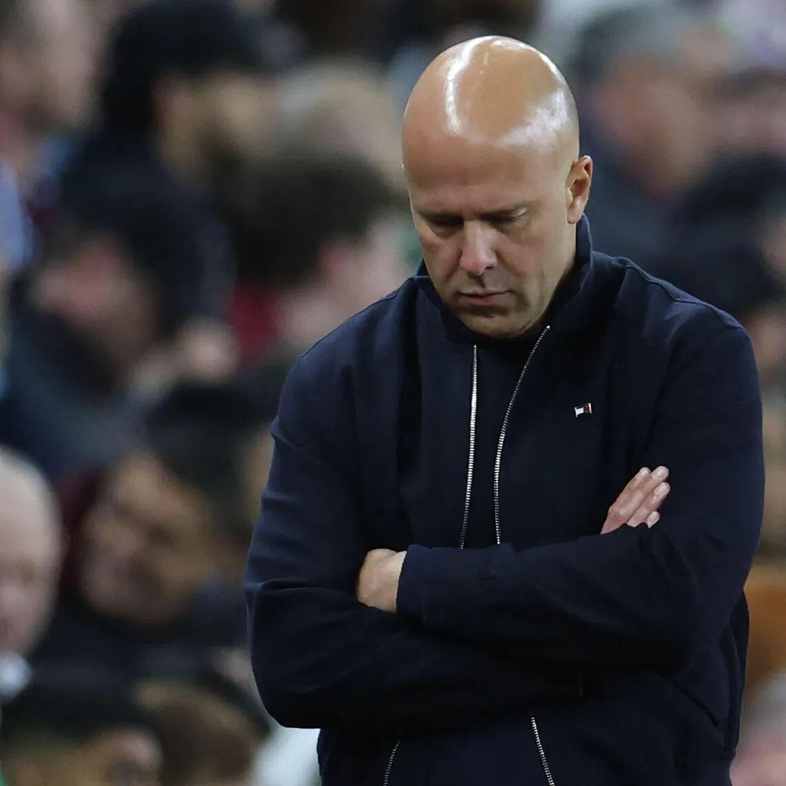 Liverpool manager Arne Slot looking dejected during the 4-2 Premier League loss to Aston Villa.