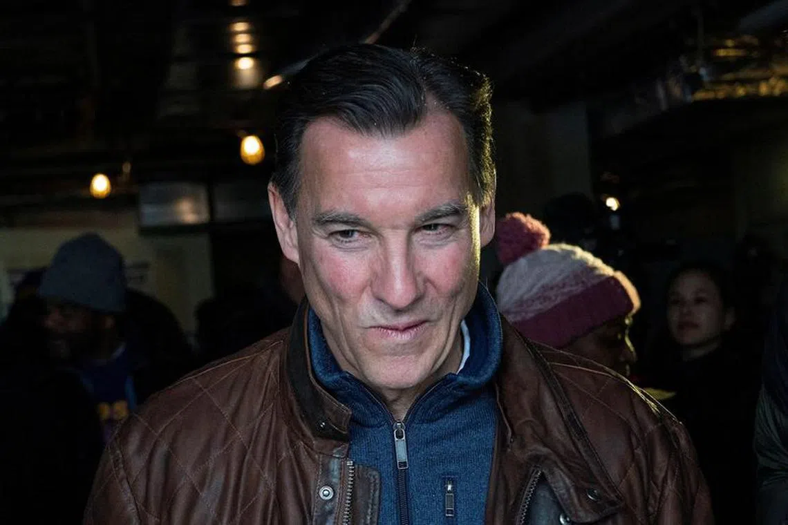 Democratic congressional candidate for New York's 3rd congressional district, Tom Suozzi, exits the building after campaigning in Westbury, New York, U.S., February 13, 2024.   REUTERS/Eduardo Munoz