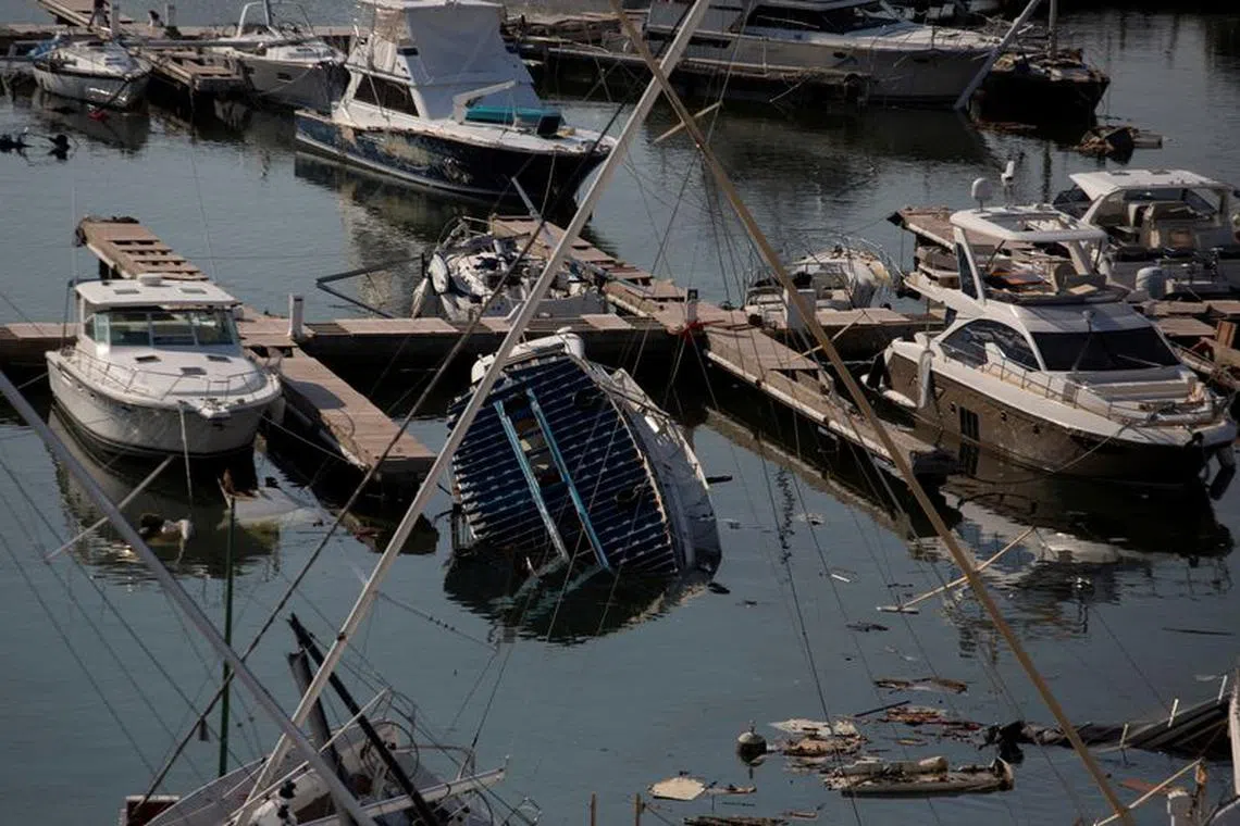 FILE PHOTO: Damaged boats are seen at the Yates Club, in the aftermath of Hurricane Otis, in Acapulco, Mexico, October 30, 2023. REUTERS/Quetzalli Nicte-Ha/File Photo