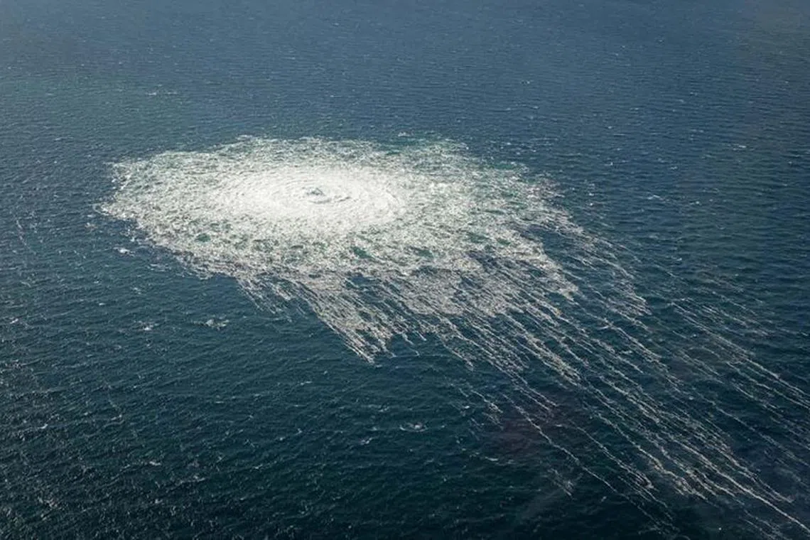 FILE PHOTO: Gas bubbles from the Nord Stream 2 leak reaching surface of the Baltic Sea in the area shows disturbance of well over one kilometre  diameter near Bornholm, Denmark, September 27, 2022.  Danish Defence Command/Handout via REUTERS/File Photo