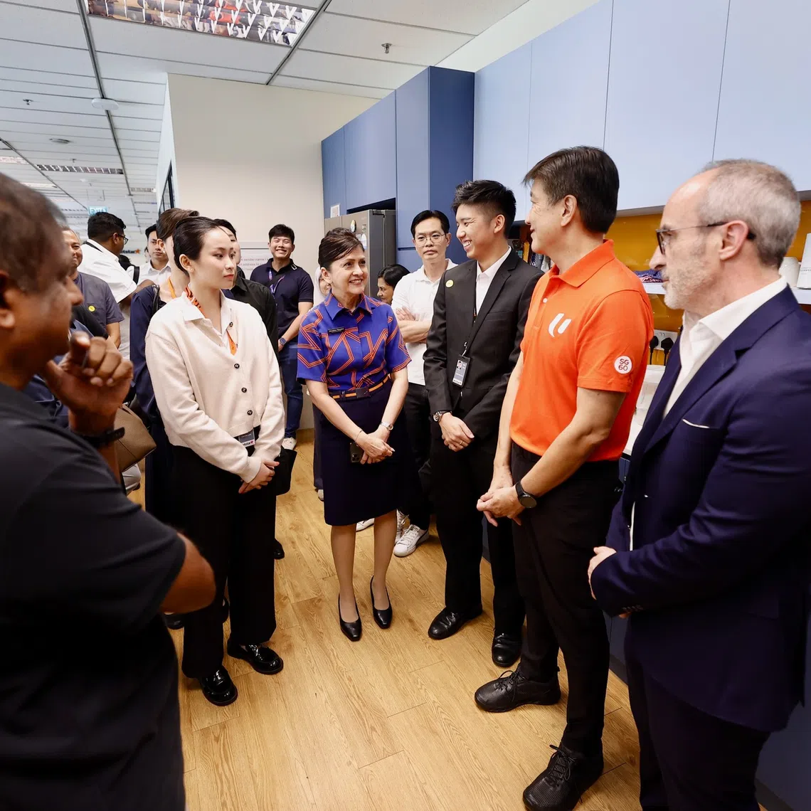 Labour chief Ng Chee Meng (second from right) meeting Jetstar Asia workers on June 18.