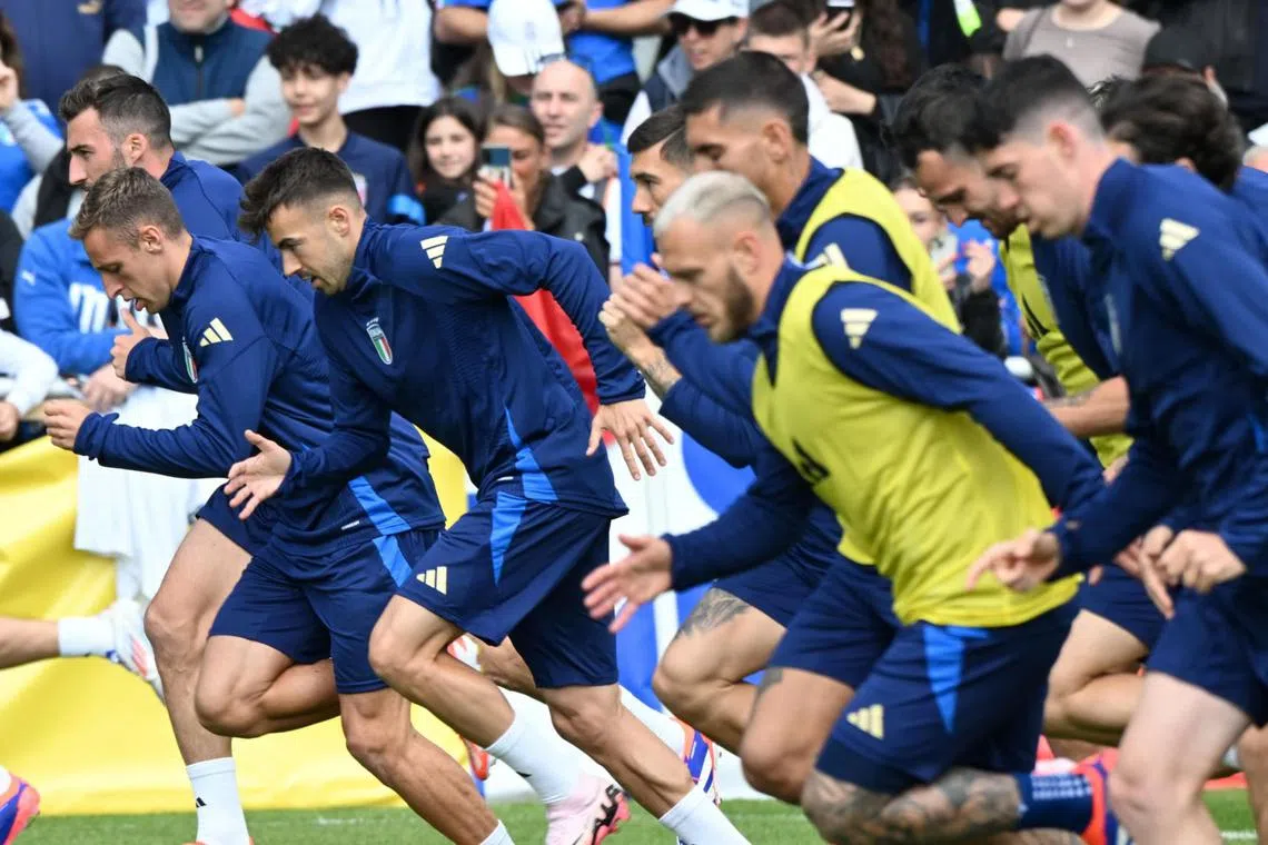 Italy's national football team players participating in a training session in Iserlohn, Germany, on June 11.