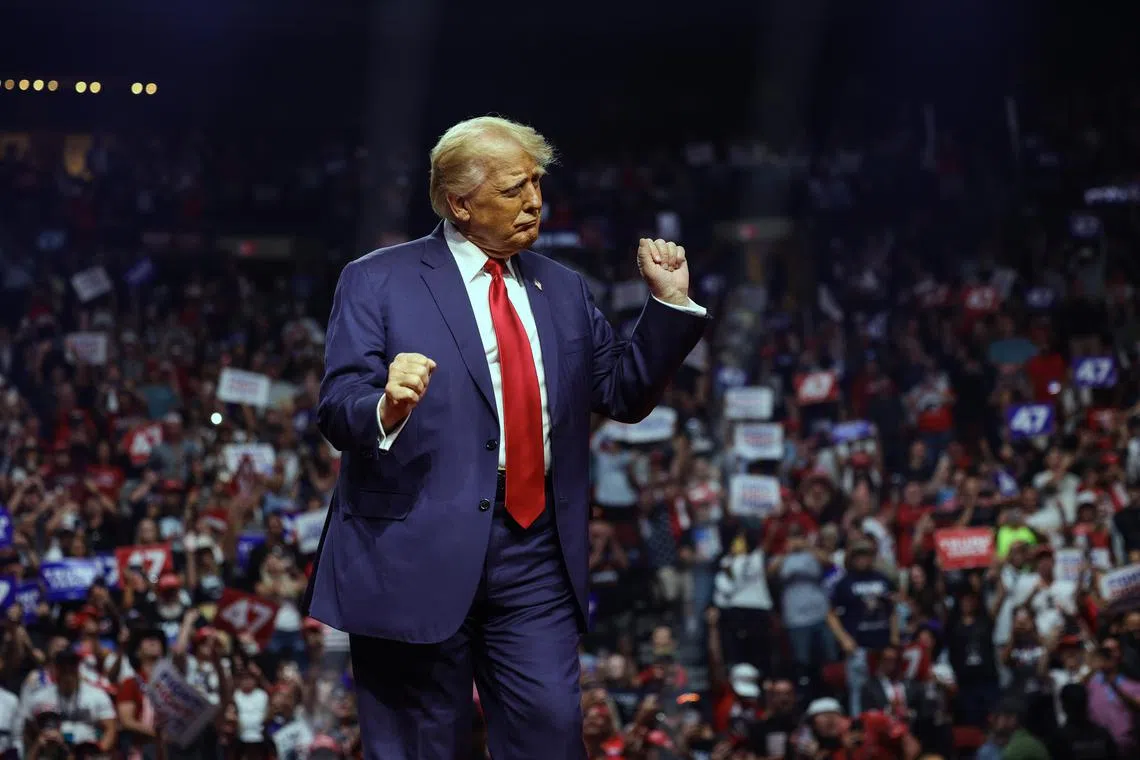 Donald Trump dances during a campaign rally at the Desert Diamond Arena in Glendale, Arizona on Aug 23, 2024. 
