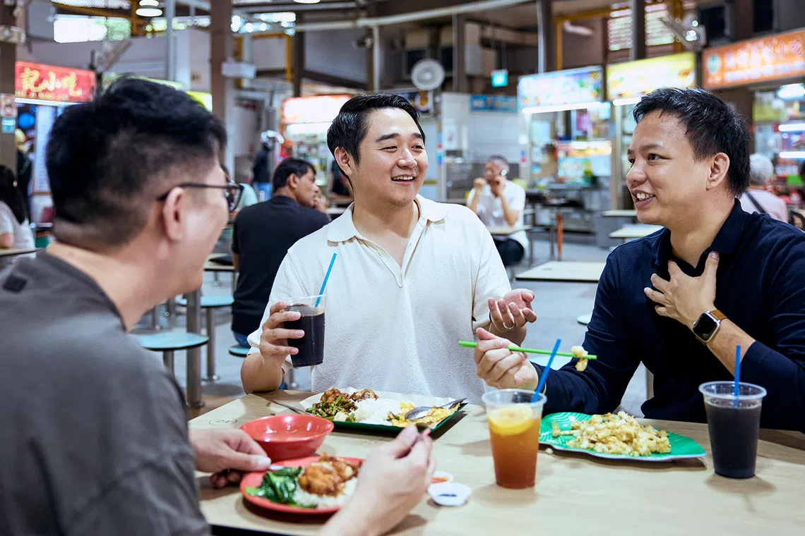 Gushcloud CFO Andrew Lim with two male colleagues.  