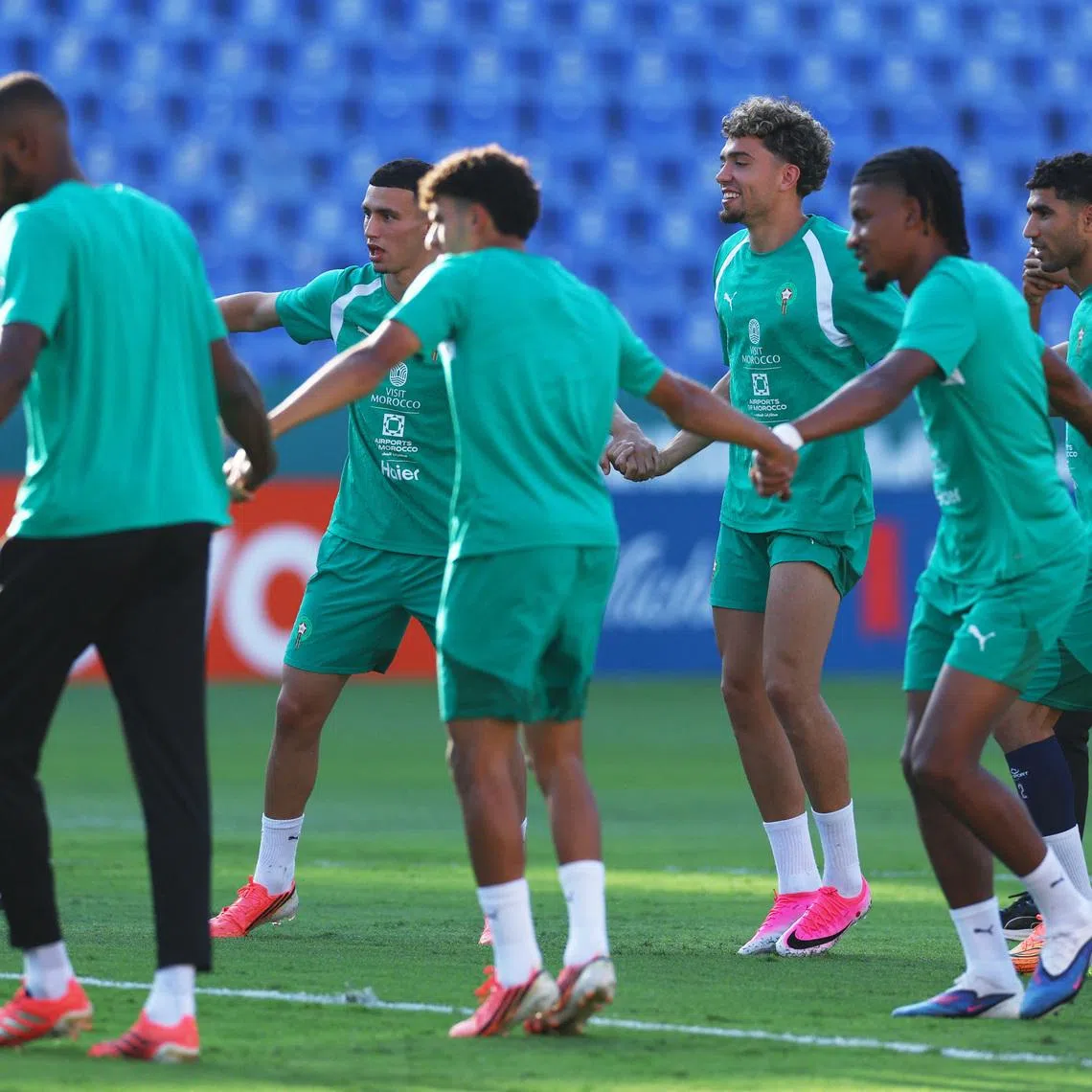 Soccer Football - FIFA World Cup 2026 - Morocco Training - Estadio Universitario, Monterrey, Mexico - June 27, 2026 Morocco's Achraf Hakimi, Bilal El Khannouss and Ismael Saibari with teammates during training REUTERS/Daniel Becerril