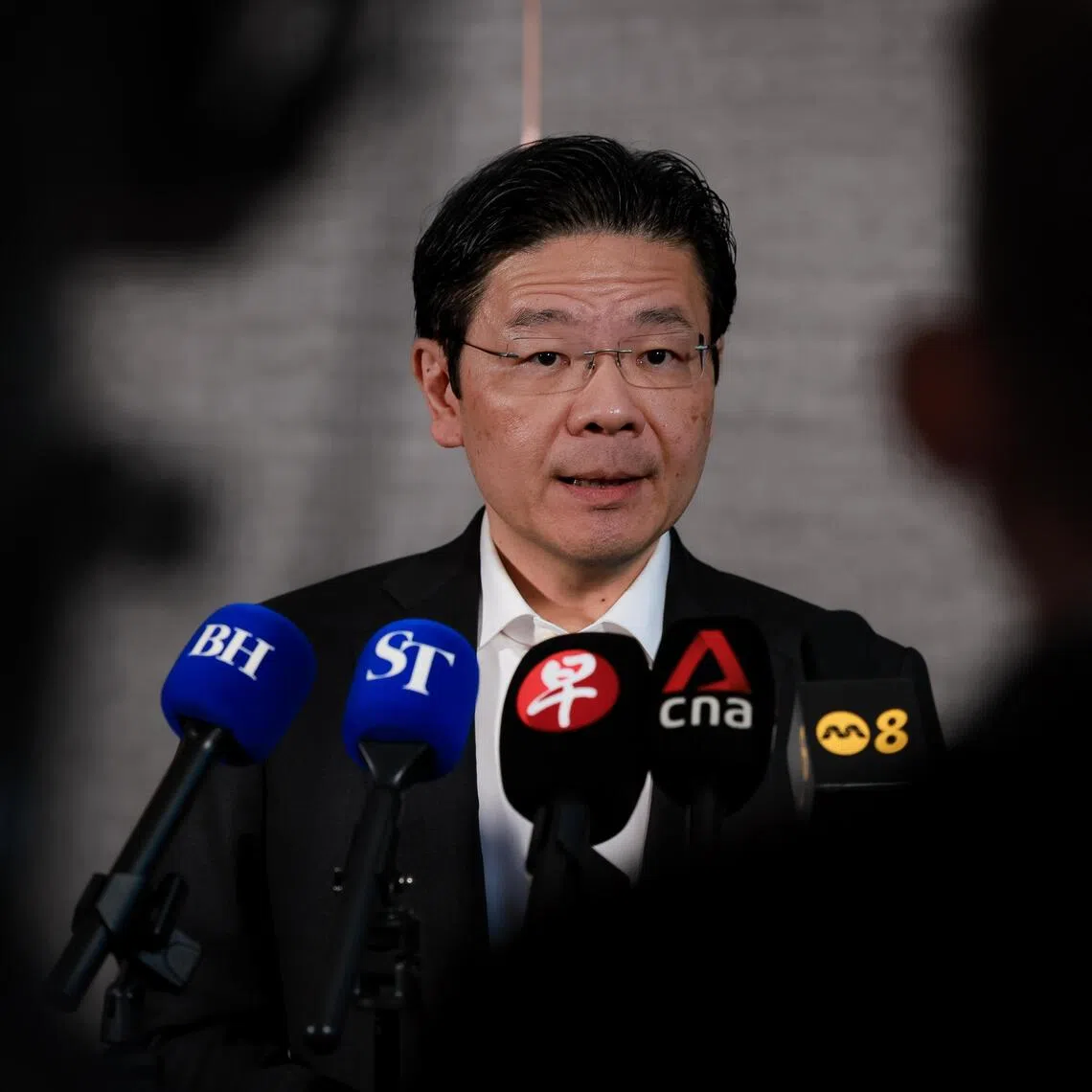 Prime Minister Lawrence Wong speaking to reporters on Oct 28.