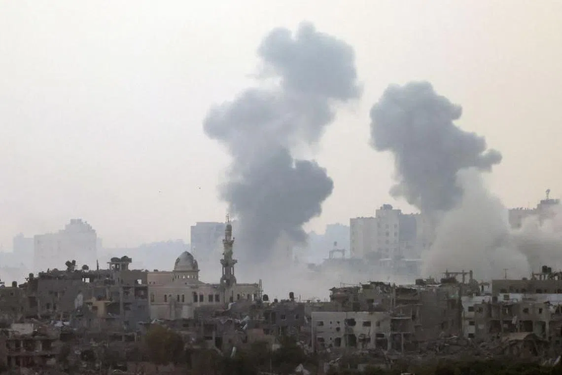 FILE PHOTO: Smoke is rising after an Israeli strike on Gaza seen from a viewpoint in Southern Israel October 24, 2023. REUTERS/Violeta Santos Moura/File Photo
