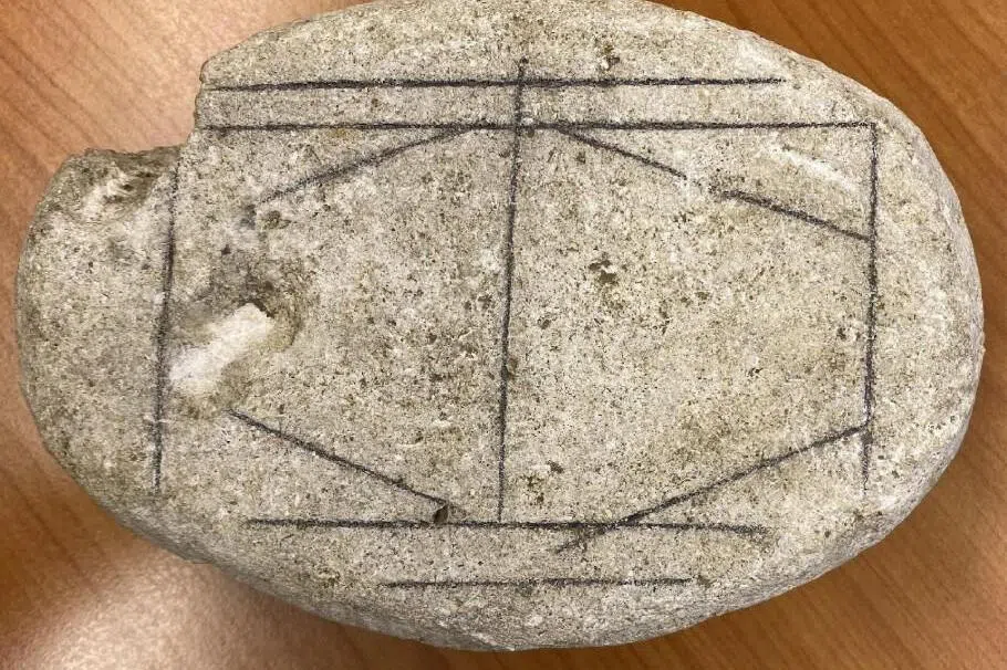Scientists used artificial intelligence to figure out that this stone found in the Netherlands is an ancient board game.