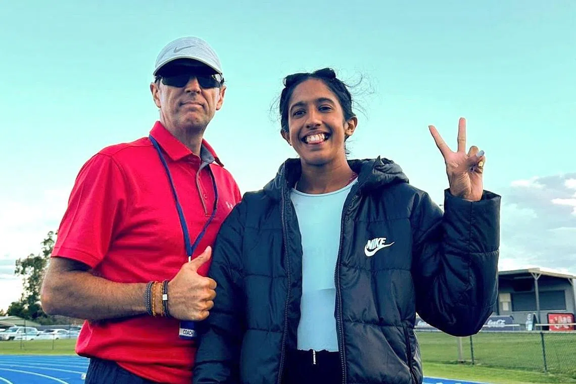 Sprinter Shanti Pereira with her coach Luis Cunha after she became the first Singaporean woman to go under 23sec in the 200m, on April 2.
