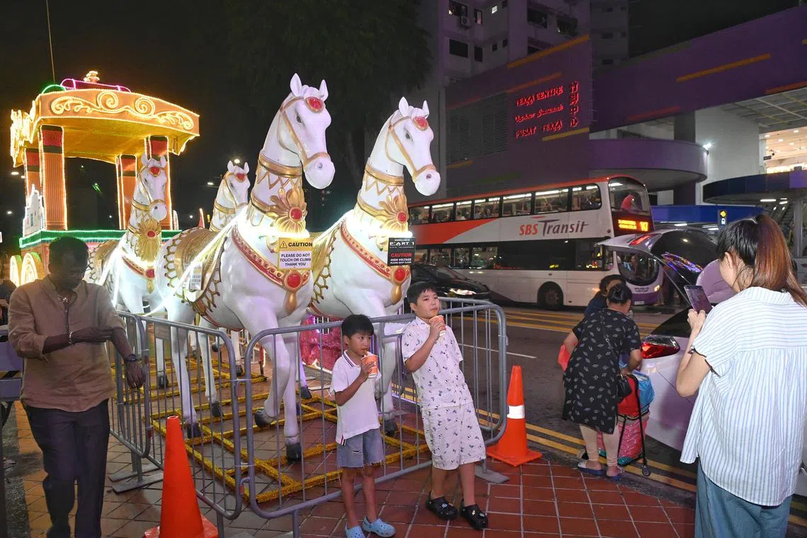 A golden chariot pulled by four horses along Serangoon Road is one of the main decorative focal points of this year's light-up. In Hindu mythology, horses represent the Sun and its yearly course.