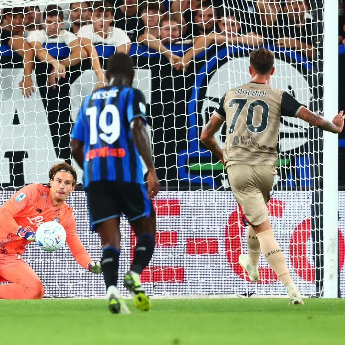 Cagliari’s Daniel Maldini scoring the winning goal from the penalty spot in the Italian Serie A match against Atalanta in Bergamo on Sept 12.