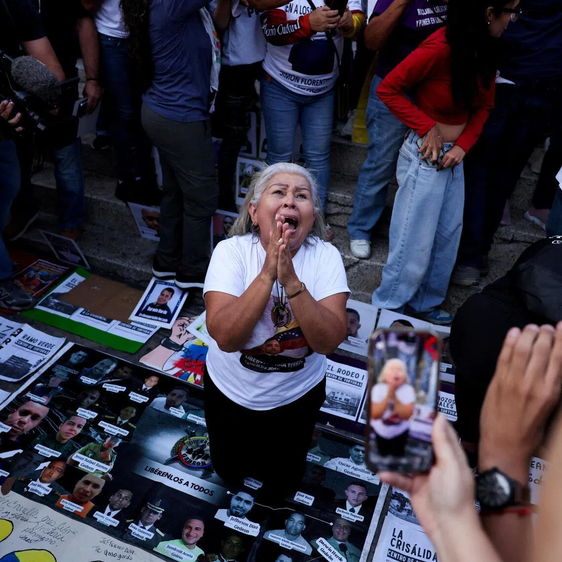 A relative of a political prisoner reacts outside the Helicoide detention center, after the news that Venezuelan opposition politicians Jesus Armas and Mr Juan Pablo Guanipa were released from detention on Feb 8.
