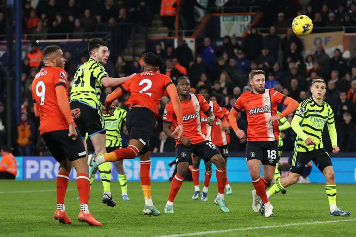 Soccer Football - Premier League - Luton Town v Arsenal - Kenilworth Road, Luton, Britain - December 5, 2023 Arsenal's Declan Rice scores their fourth goal REUTERS/David Klein