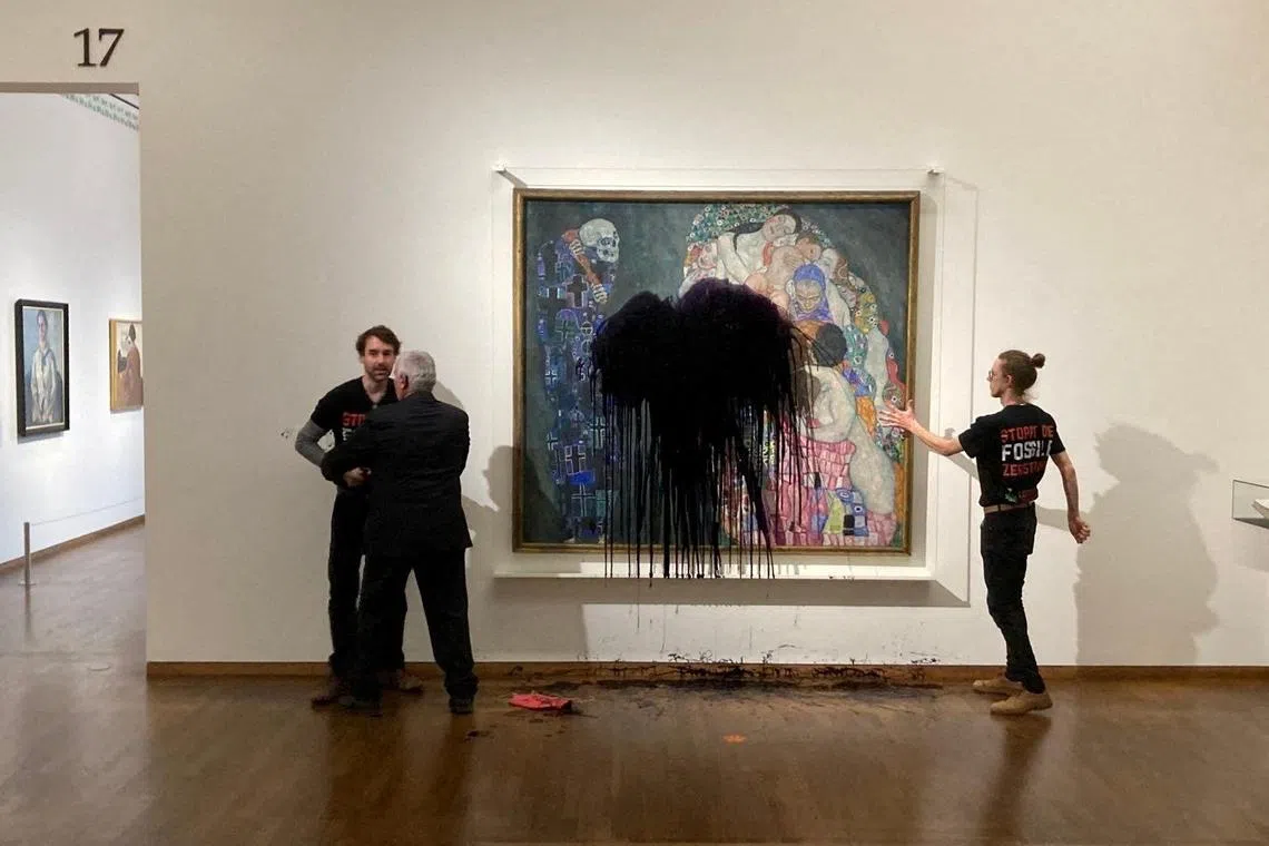 Gustav Klimt's Death And Life is seen after activists of Last Generation spilled oil on it in Leopold museum in Vienna, Austria, on Nov 15, in this handout photo.