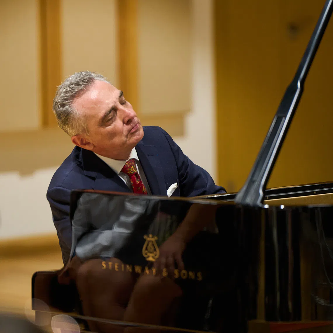 French pianist Michel Dalberto played with fire, purpose and projection, yet was careful to differentiate between quieter sections and those with barnstorming.        