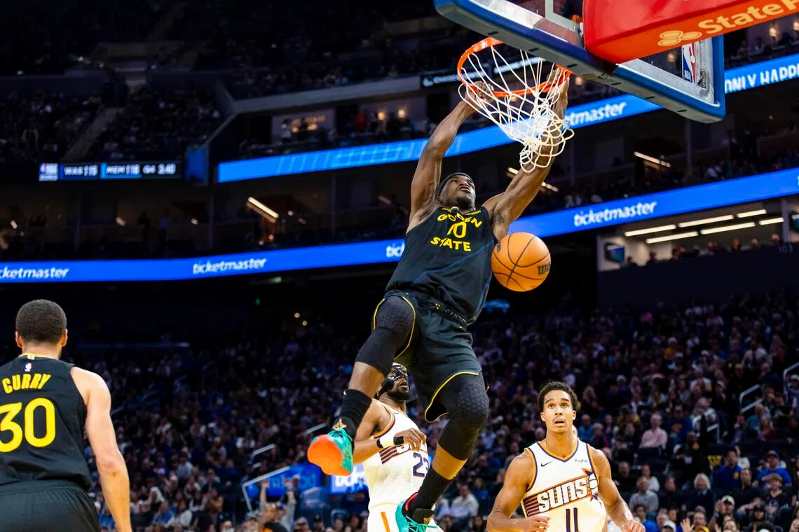 Golden State Warriors forward Jimmy Butler dunks the ball against the Phoenix Suns during the third quarter at Chase Center.
