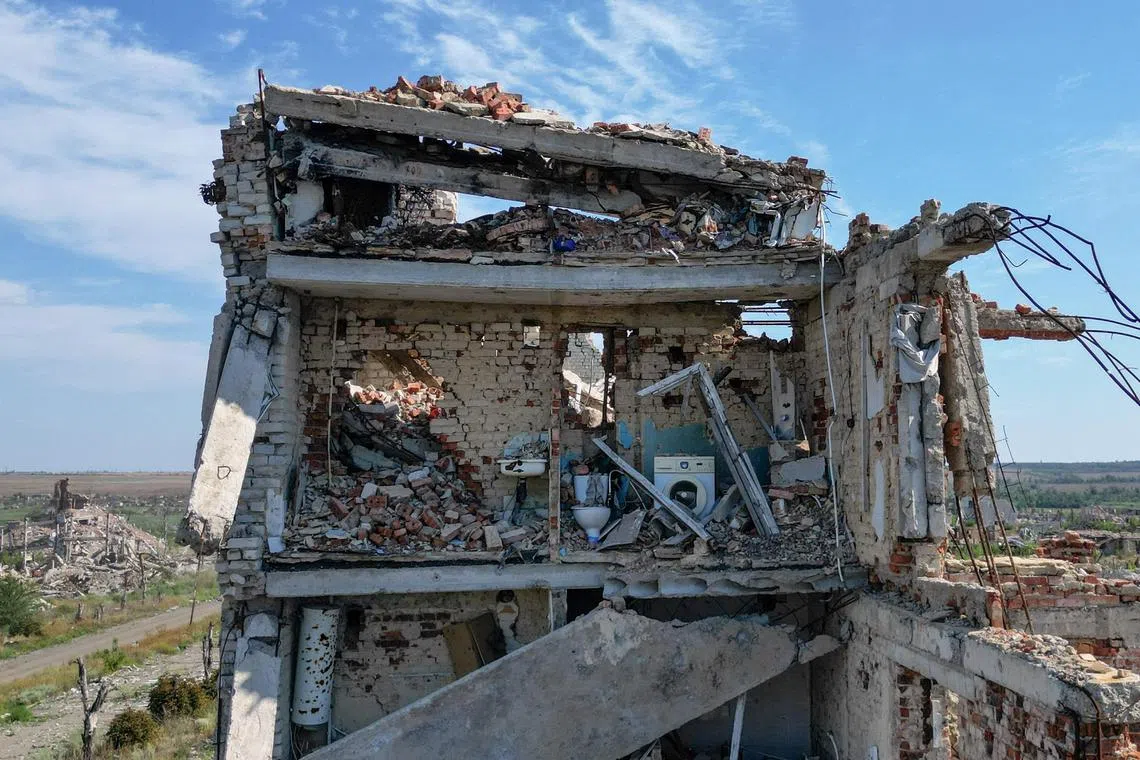 A residential building in the abandoned, Russian-controlled town of Maryinka, in Ukraine's Donetsk region, on Aug 7.