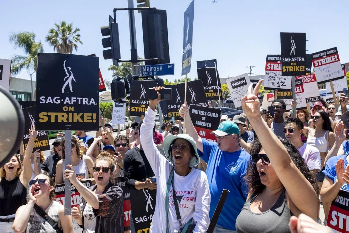 Writers Guild of America and Screen Actors Guild members and supporters rally outside Paramount Studios in Los Angeles, California, on July 14, 2023. 