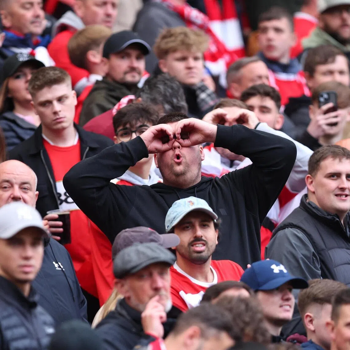 A Middlesbrough fan mocking Southampton fans for the "spygate" incident during the sides' 0-0 draw in the first leg of their Championship play-off semi-final on May 9. 