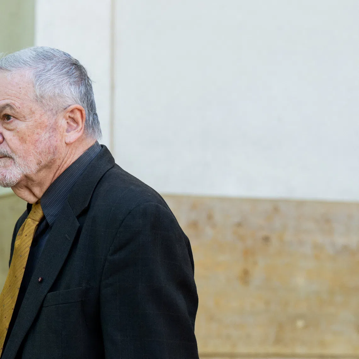 Former National Institutes of Health (NIH) official David Morens departs following his arraignment on charges of evading federal records requests related to COVID-19 pandemic research grants and the use of personal email for government business, at U.S. District Court in Greenbelt, Maryland, U.S., May 8, 2026. REUTERS/Annabelle Gordon