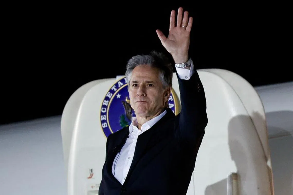 U.S. Secretary of State Antony Blinken boards a plane to travel as he departs Crete for Amman, the next stop on his week-long trip aimed at calming tensions across the Middle East, in Crete, Greece, January 6, 2024. REUTERS/Evelyn Hockstein/Pool