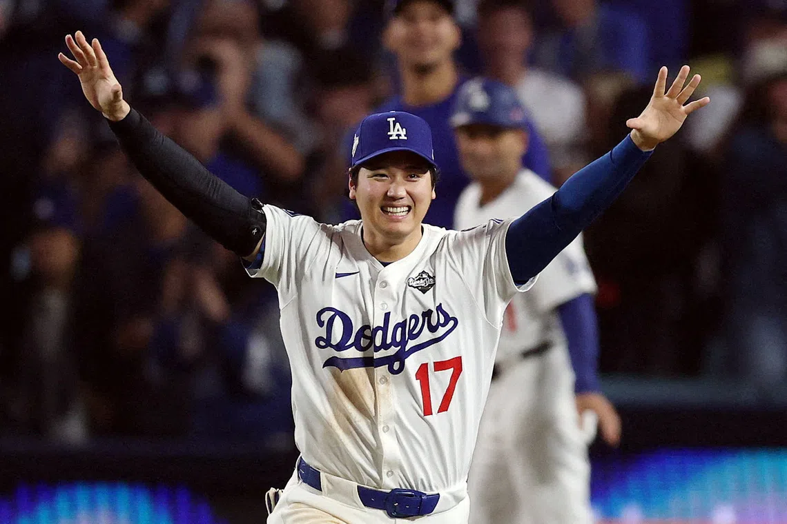 Oct 27, 2025; Los Angeles, California, USA; Los Angeles Dodgers designated hitter Shohei Ohtani (17) celebrates after winning in the eighteenth inning against the Toronto Blue Jays in game three of the 2025 MLB World Series at Dodger Stadium. Mandatory Credit: Kiyoshi Mio-Imagn Images