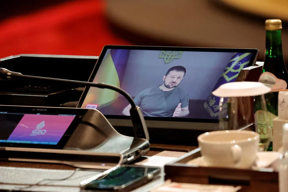 Ukraine's President Volodymyr Zelenskiy addresses a session via video conferencing during the G20 Leaders' Summit, in Nusa Dua, Bali, Indonesia, November 16, 2022. REUTERS/Willy Kurniawan/Pool