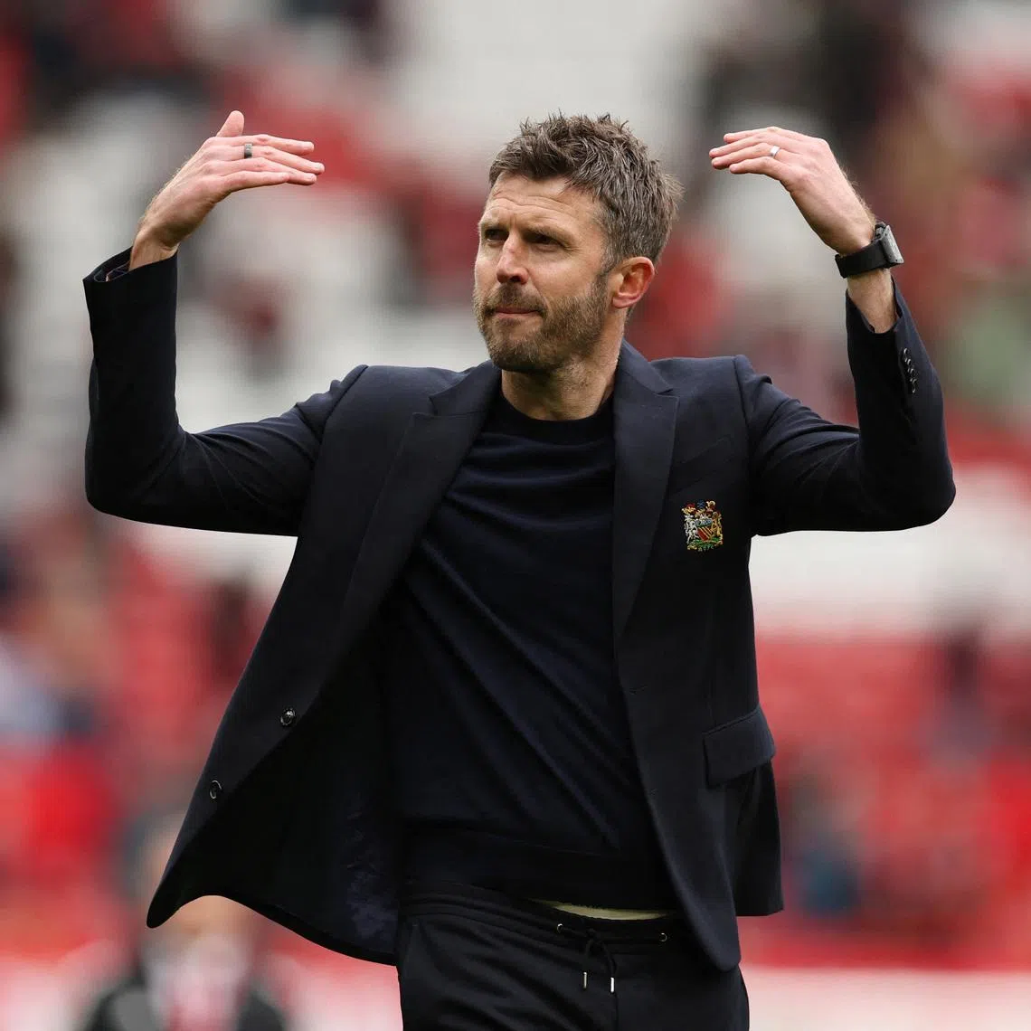 Soccer Football - Premier League - Manchester United v Liverpool - Old Trafford, Manchester, Britain - May 3, 2026 Manchester United manager Michael Carrick celebrates after the match REUTERS/Chris Radburn