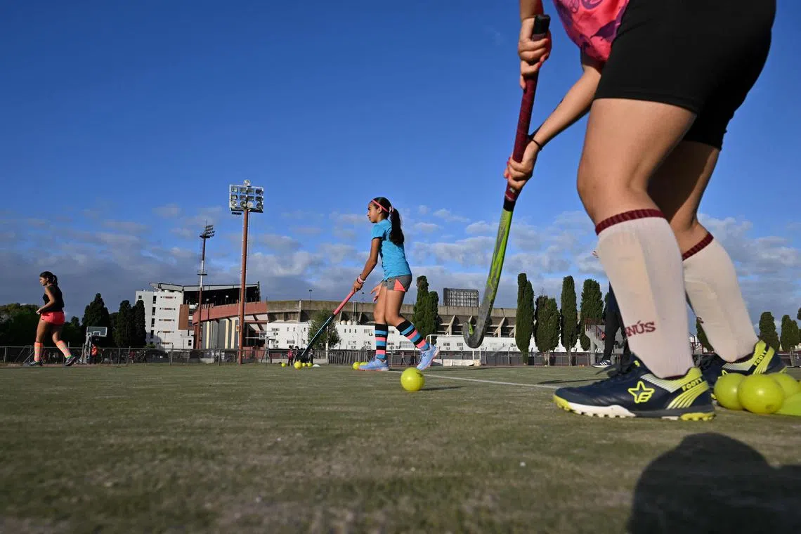 Girls learning field hockey at Argentinian club Lanus in Buenos Aires province on Oct 10, 2024.