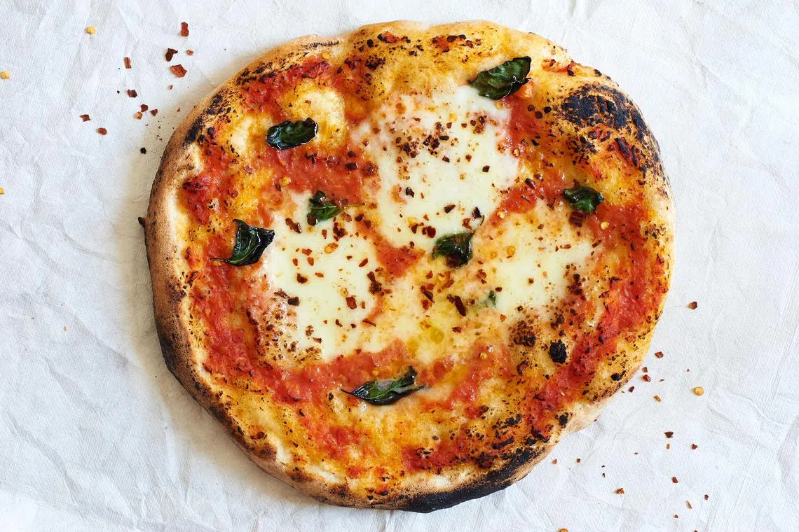 FILE PHOTO: The average cost of cooking a Pizza Margherita is up almost 30% from a year ago.