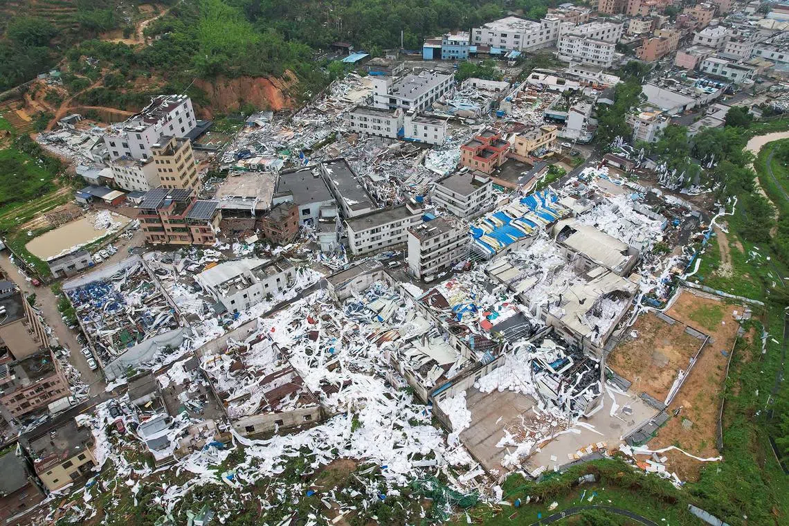 A drone view shows damaged buildings following a tornado at a village in Guangzhou, Guangdong province, China April 28, 2024. 