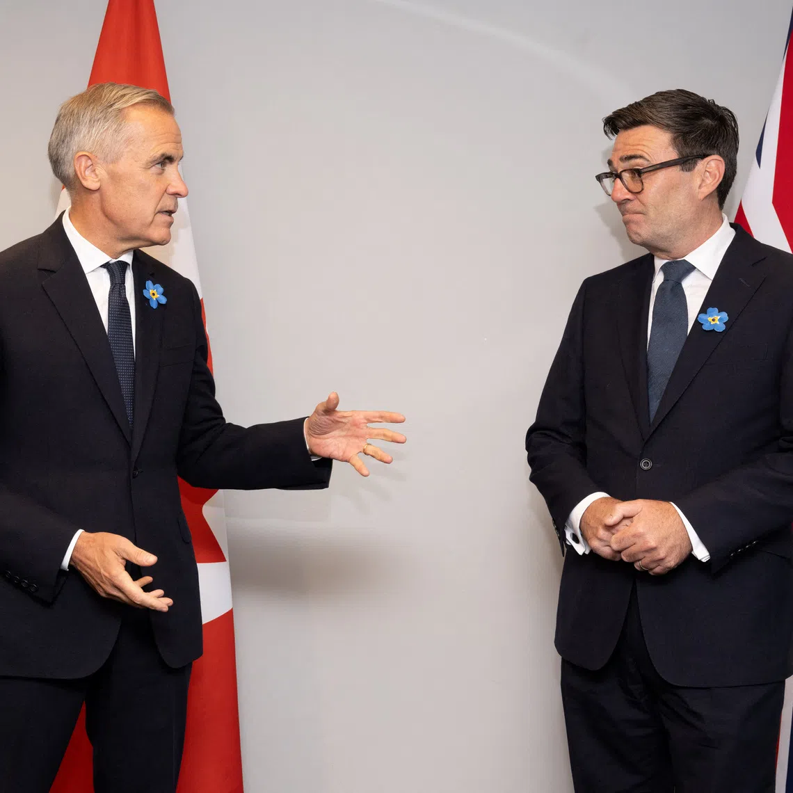 Canadian Prime Minister Mark Carney and British Prime Minister Andy Burnham speak as they attend a bilateral meeting, in Everton, Merseyside, Britain, September 16. 2026. PAUL COOPER/Pool via REUTERS