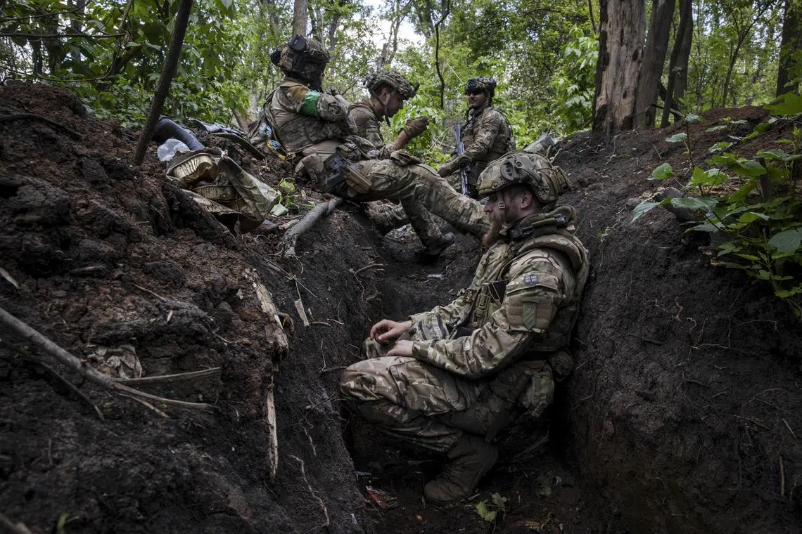 Ukrainian troops at the front line south of Bakhmut, where they have reported gaining more ground.