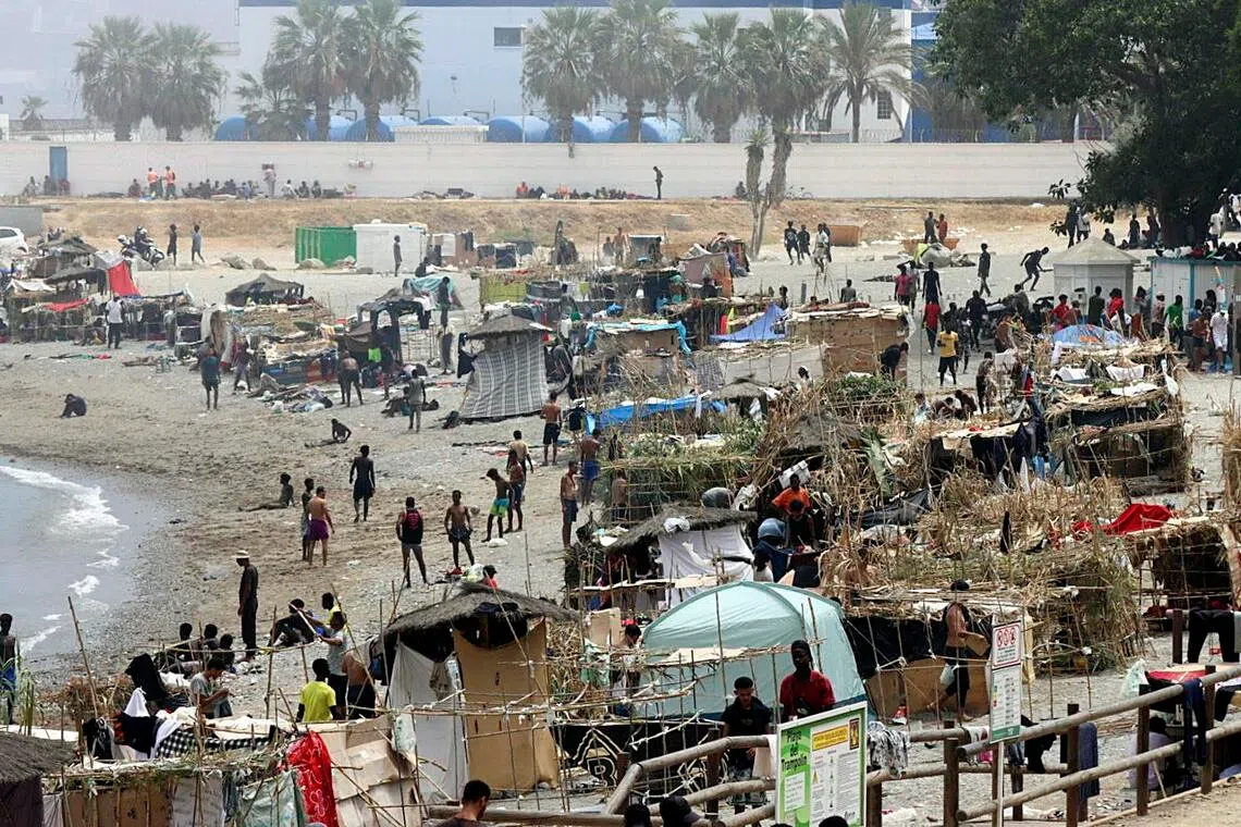 Trampolin Beach in the Spanish North African enclave of Ceuta has undergone a rapid transformation: a small cluster of makeshift shelters less than a week ago has expanded to more than 80.