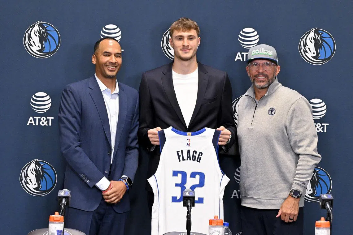 From left: Dallas Mavericks general manager Nico Harrison, first overall pick Cooper Flagg and head coach Jason Kidd pose for a photo.