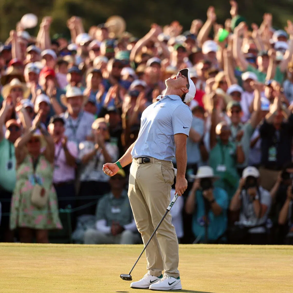 Apr 12, 2026; Augusta, Georgia, USA; Rory McIlroy reacts after making a putt to win the 2026 Masters Tournament at Augusta National Golf Club. Mandatory Credit: Bill Streicher-Imagn Images