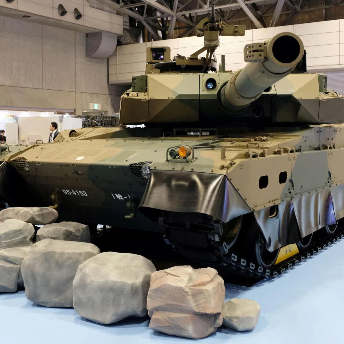FILE PHOTO: A Japanese Ground Self-Defense Force Type 10 tank is displayed at a defence equipment fair called 'DSEI Japan' in Chiba, east of Tokyo, Japan, November 10, 2019, in this photo take by Kyodo. Mandatory credit Kyodo/via REUTERS/File Photo