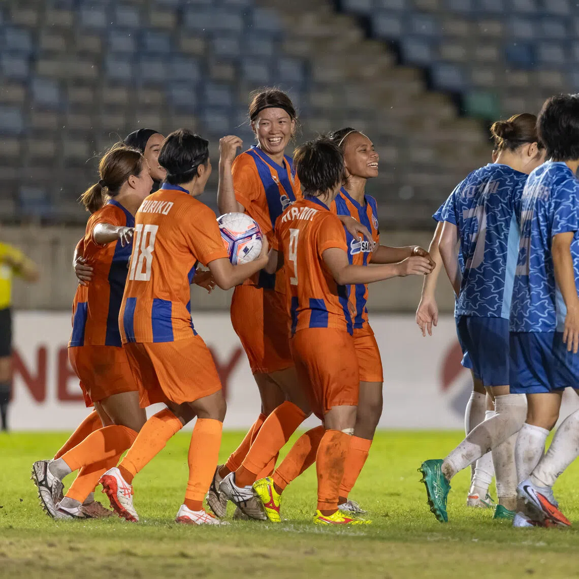 FC Jurong’s Kana Kitahara (tallest) celebrating after scoring her team’s first goal in the Asian Football Confederation Women’s Champions League on Aug 20. They eventually fell to a narrow 2-1 loss to Taiwanese side New Taipei City Hang Yuan FC.