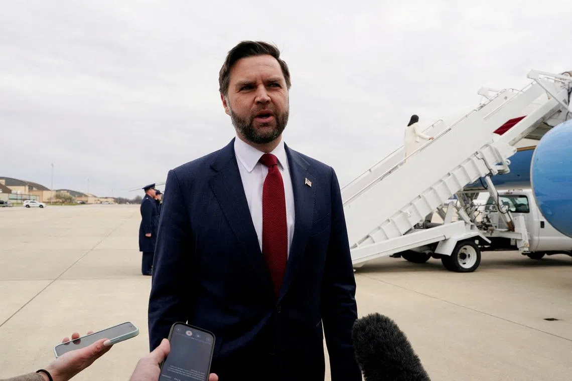 FILE PHOTO: U.S. Vice President JD Vance speaks to mebers of the media as he travels to Michigan, at Joint Base Andrews, Maryland, U.S., on Wednesday, March 18, 2026. Elizabeth Frantz/Pool via REUTERS/File Photo