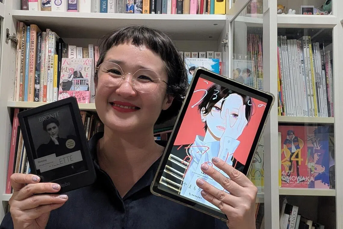 Ms Natalie Tan with her current reads – Charlotte Bronte’s Vilette on her Kobo, and romance manga In The Clear Moonlit Dusk by Mika Yamamori on her tablet. 