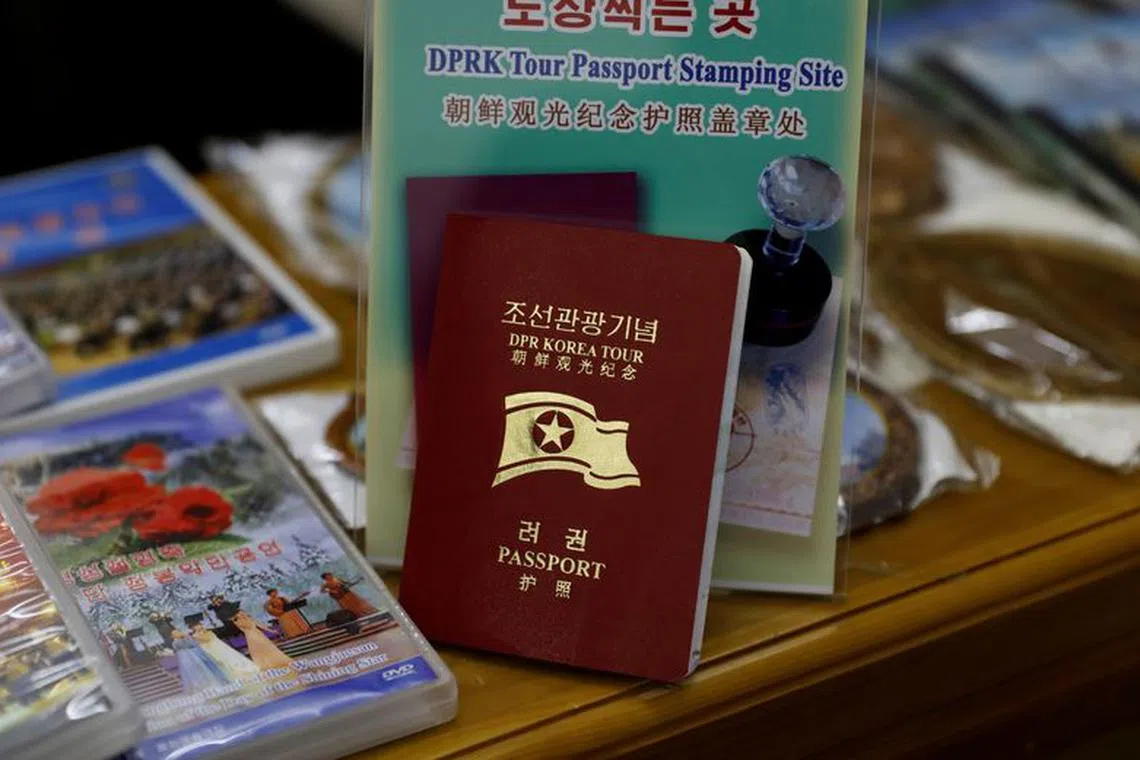 FILE PHOTO: A North Korean tour passport is seen at a souvenir shop at Juche Tower in Pyongyang, North Korea, September 11, 2018. REUTERS/Danish Siddiqui