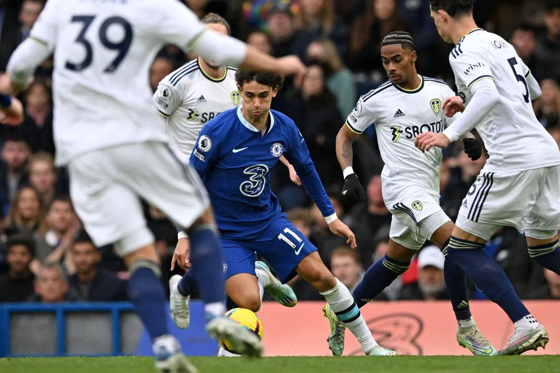 Chelsea's Portuguese striker Joao Felix is surrounded during the English Premier League football match between Chelsea and Leeds United at Stamford Bridge. The Blues won 1-0.