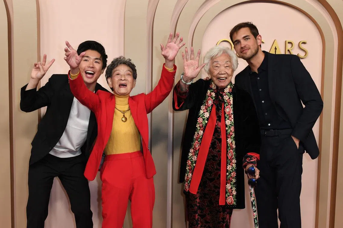 (From L) US director Sean Wang, Zhang Li Hua, Yi Yan Fuei and Sam Davis attend the Oscar Nominees Luncheon at the Beverly Hilton in Beverly Hills, California, on February 12, 2024. (Photo by Valerie MACON / AFP)