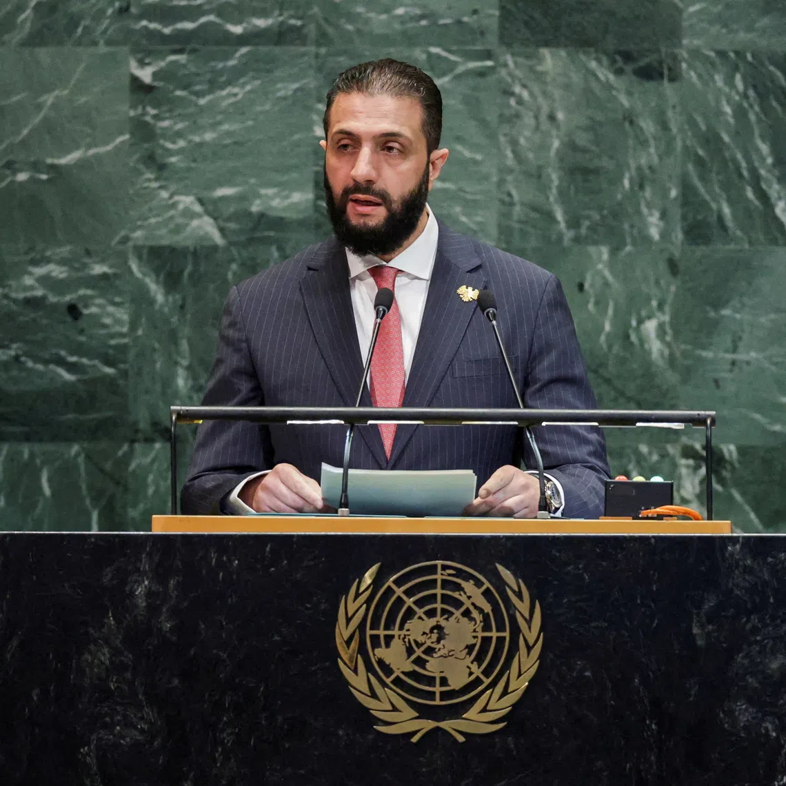 FILE PHOTO: Syrian President Ahmed al-Sharaa addresses the 80th United Nations General Assembly (UNGA) at the U.N. headquarters in New York, U.S., September 24, 2025. REUTERS/Jeenah Moon/File Photo