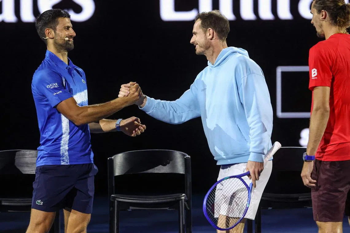 Britain’s Andy Murray (right) shaking hands with Serbia’s Novak Djokovic during a charity event titled Night with Novak on Rod Laver Arena in Melbourne on Jan 9, 2025.